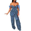 Stylish Yellow Jumpsuit: Floral Prints and Trendy Cut - Out Design