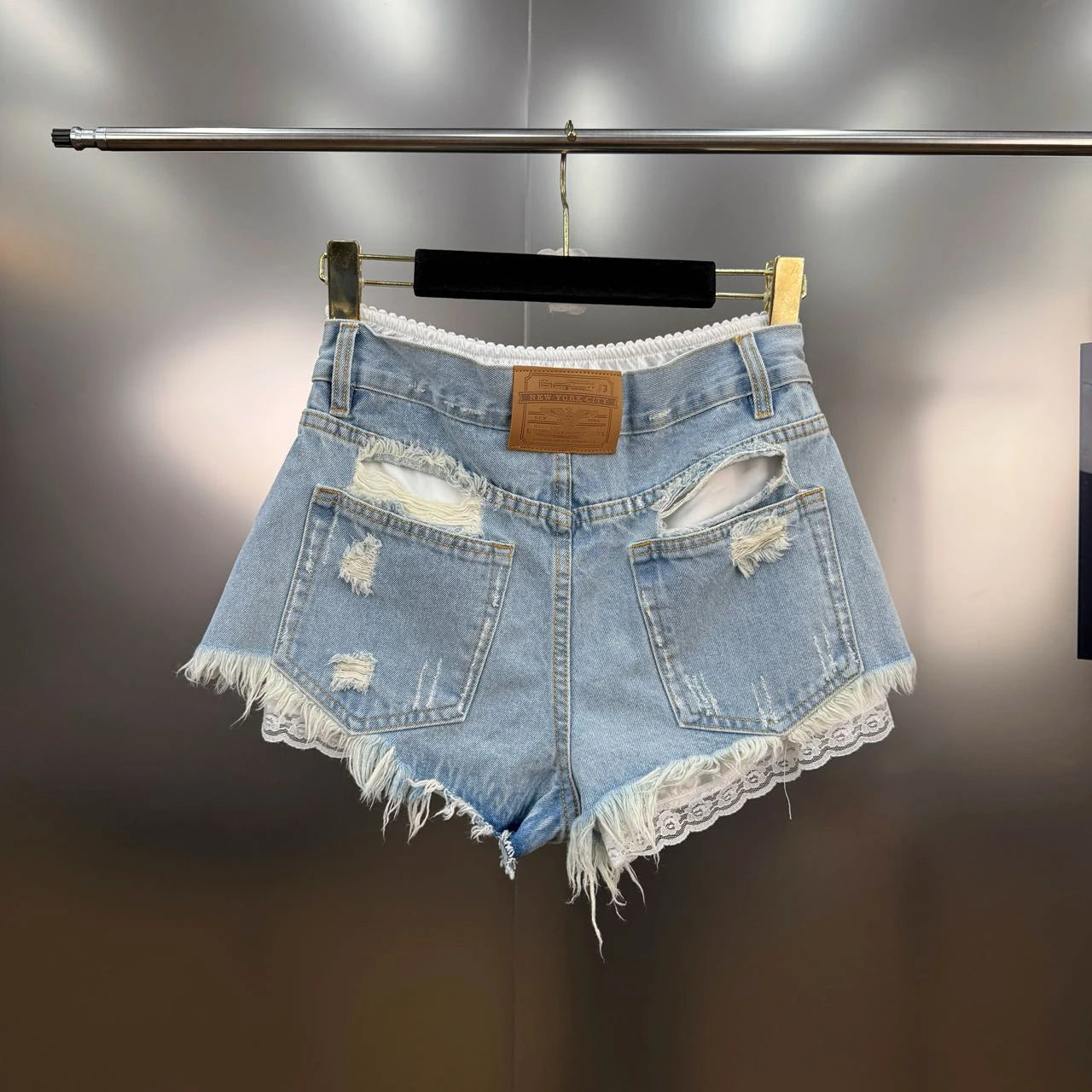Summer 2025 New French Retro Lace Splicing Ripped Rough Edge Fake Two-piece Denim Shorts Spice Girl Y2K High-waisted Slim Jeans